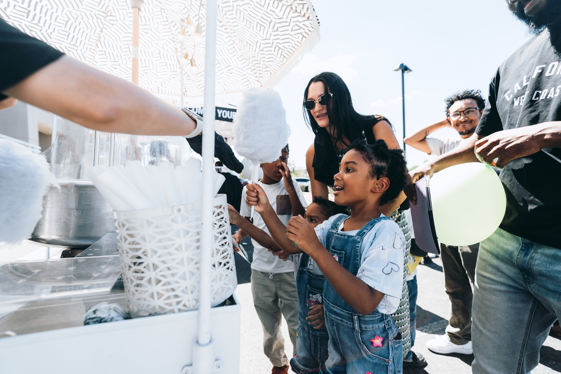 A child enjoying launch Sunday with family